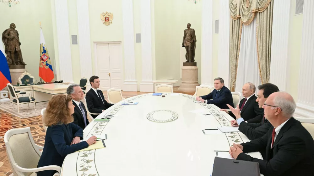 Russian President Vladimir Putin, presidential envoy Kirill Dmitriev and foreign policy aide Yuri Ushakov attend a meeting with U.S. President Donald Trump's special envoy Steve Witkoff and son-in-law Jared Kushner at the Kremlin in Moscow, Russia, December 2, 2025. Sputnik/Kristina Kormilitsyna/Pool via REUTERS ATTENTION EDITORS - THIS IMAGE WAS PROVIDED BY A THIRD PARTY.