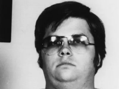 John Lennon's assassin Mark David Chapman poses for a mugshot on December 9, 1980 in New York. (Photo by Bureau of Prisons/Getty Images)