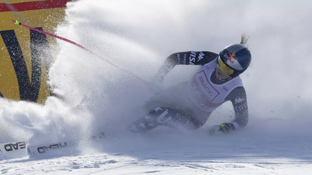 United States' Lindsey Vonn arrives at the finish area of an alpine ski, women's World Cup downhill in St. Moritz, Switzerland, Friday Dec.12, 2025. (AP Photo/Luciano Bisi)