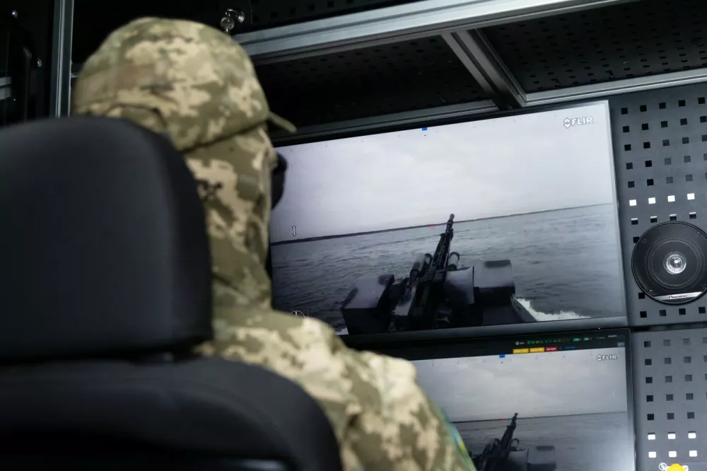 Officer of the Security Service of Ukraine operates the next-generation multipurpose Sea Baby unmanned surface vehicle, on October 17, 2025. (,Image: 1047592576, License: Rights-managed, Restrictions:, Model Release: no