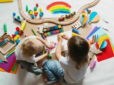 Children drawing and making crafts in kindergarten or daycare. Little kids with educational toys and supplies for creative. hildren education and development in preschool or childcare.