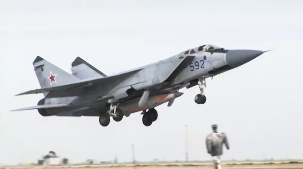 In this video grab provided by RU-RTR Russian television via AP television on Thursday, March 1, 2018, a Russian MiG-31 fighter jet carrying the new Kinzhal hypersonic missile flies at an undisclosed location in Russia. President Vladimir Putin declared Thursday that Russia has developed a range of new nuclear weapons, claiming they can't be intercepted by enemy. (RU-RTR Russian Television via AP)
