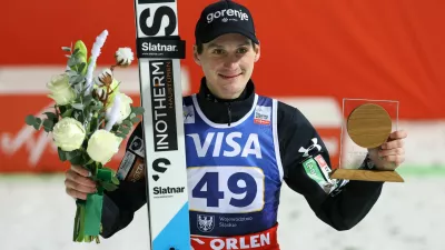 Ski Jumping - FIS Ski Jumping World Cup - Wisla, Poland - December 6, 2025 Slovenia's Domen Prevc celebrates on the podium after winning the Men's Individual Large Hill REUTERS/Kacper Pempel