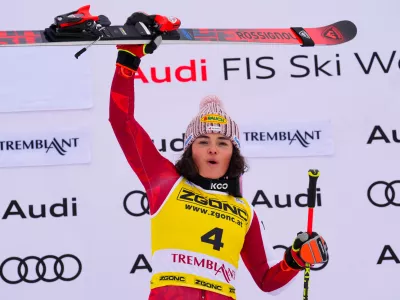 Julia Scheib, of Austria, celebrates after her victory in the women's World Cup giant slalom in Mont Tremblant, Quebec, Sunday, Dec. 7, 2025. (Sean Kilpatrick/The Canadian Press via AP)