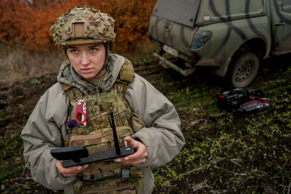 A Ukrainian drone operator from the Kraken 1654 unit, callsign Imla, flies a Vampire drone during a demonstration for The Associated Press, Wednesday, Nov. 5, 2025, in Kharkiv Oblast, Ukraine. (AP Photo/Julia Demaree Nikhinson)