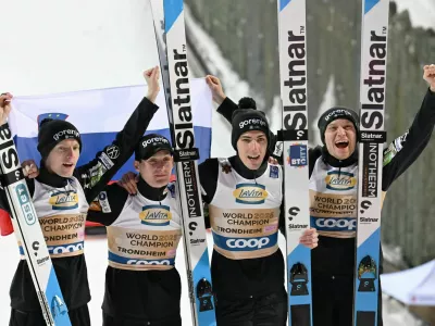 06 March 2025, Norway, Trondheim: (L-R) Slovenia jumpers Lovro Kos, Domen Prevc, Timi Zajc and Anze Lanisek celebrate their first place after the men's team jumping 2nd round event at the FIS Ski Jumping World Championship in Trondheim. Photo: Hendrik Schmidt/dpa