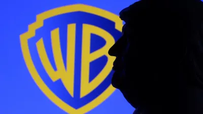 A 3D-printed miniature model depicting U.S. President Donald Trump appears in front of the Warner Bros logo in this illustration taken December 8, 2025. REUTERS/Dado Ruvic/Illustration