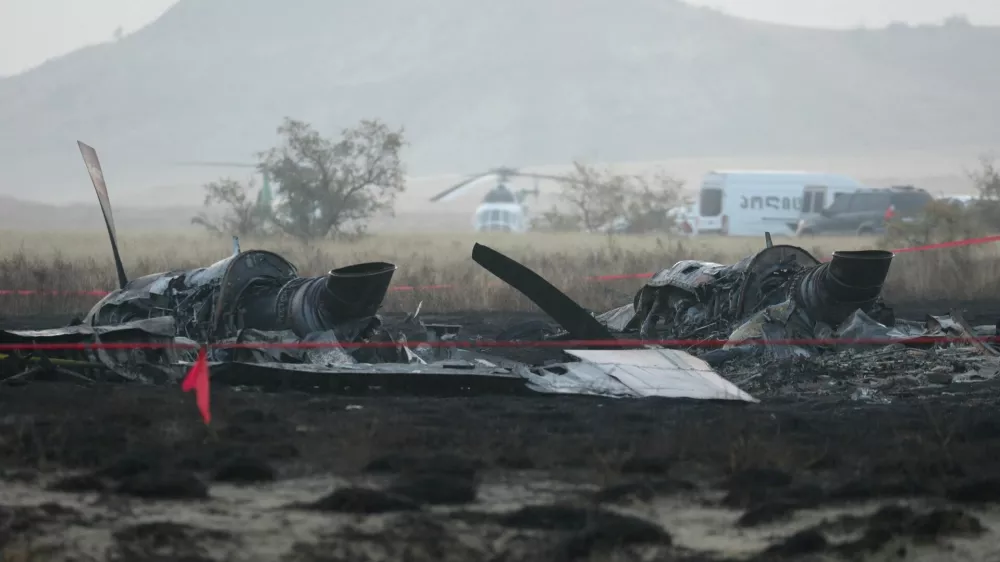 Wreckage lies at the site of the Turkish C-130 military cargo plane crash near the Azerbaijani border, in Sighnaghi municipality, Georgia, November 12, 2025. REUTERS/Irakli Gedenidze