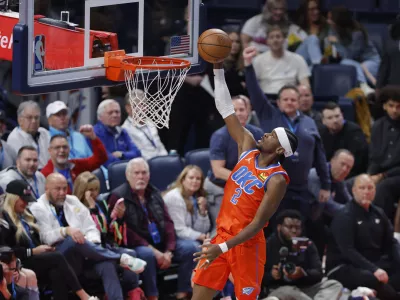 Dec 10, 2025; Oklahoma City, Oklahoma, USA; Oklahoma City Thunder guard Shai Gilgeous-Alexander (2) goes up for a basket against the Phoenix Suns during the third quarter at Paycom Center. Mandatory Credit: Alonzo Adams-Imagn Images