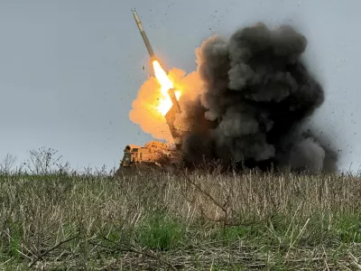 Ukrainian servicemen fire a Multiple Launch Rocket System (MLRS) towards Russian troops, amid Russia's attack on Ukraine, near the frontline town of Pokrovsk in Donetsk region, Ukraine December 9, 2025. REUTERS/Stringer