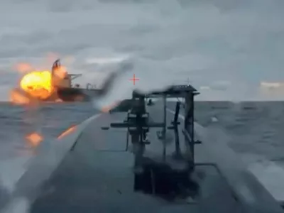 A Ukrainian sea drone shows the Dashan, a tanker part of Russia's so-called "shadow fleet", being struck by another sea drone in the Black Sea, December 10, 2025, in this picture obtained from a video. Shared by Security Service Official/Handout via REUTERS  THIS IMAGE HAS BEEN SUPPLIED BY A THIRD PARTY. Verification note: Reuters was able to verify the video showed the Dashan tanker by comparing the deck, cranes and structures with file imagery. The location and date were confirmed by the SBU source's account and ship tracking data.