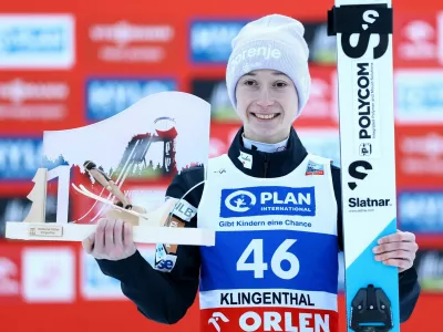 Ski Jumping - FIS Ski Jumping World Cup - Klingenthal, Germany - December 13, 2025 Slovenia's Nika Prevc celebrates on the podium after winning the Women's Individual Large Hill REUTERS/Lisi Niesner