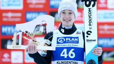 Ski Jumping - FIS Ski Jumping World Cup - Klingenthal, Germany - December 13, 2025 Slovenia's Nika Prevc celebrates on the podium after winning the Women's Individual Large Hill REUTERS/Lisi Niesner