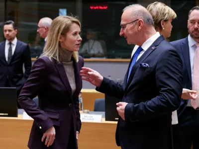 The European Commission's High Representative for Foreign Affairs and Security Policy Kaja Kallas and Croatian Foreign Minister Gordan Grlic Radman speak as they attend an EU Foreign Affairs Council in Brussels, Belgium December 15, 2025. REUTERS/Omar Havana