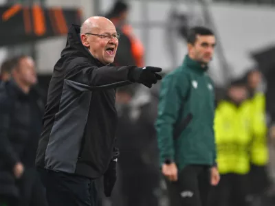 FILE - Plzen's head coach Miroslav Koubek gestures during a Europa League playoff first leg soccer match between Ferencvaros and Viktoria Plzen at the Groupama Arena stadium, in Budapest, Hungary, Thursday, Feb. 13, 2025. (AP Photo/Denes Erdos, File)