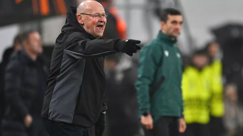 FILE - Plzen's head coach Miroslav Koubek gestures during a Europa League playoff first leg soccer match between Ferencvaros and Viktoria Plzen at the Groupama Arena stadium, in Budapest, Hungary, Thursday, Feb. 13, 2025. (AP Photo/Denes Erdos, File)