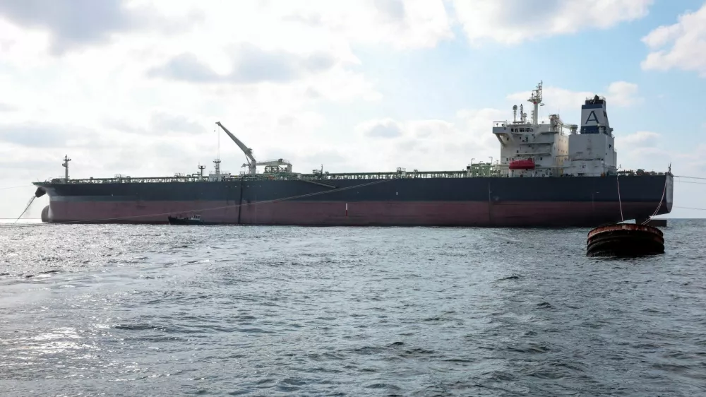 Crude oil tanker Nissos Christiana, first ship to transport oil from Syria since the fall of Bashar al-Assad's regime, is anchored in the port of Tartus, Syria, September 1, 2025. REUTERS/Mahmoud Hassano