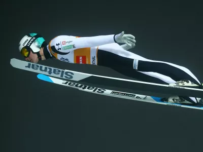 Ski Jumping - FIS Ski Jumping World Cup - Klingenthal, Germany - December 14, 2025 Slovenia's Domen Prevc in action during the first round REUTERS/Lisi Niesner