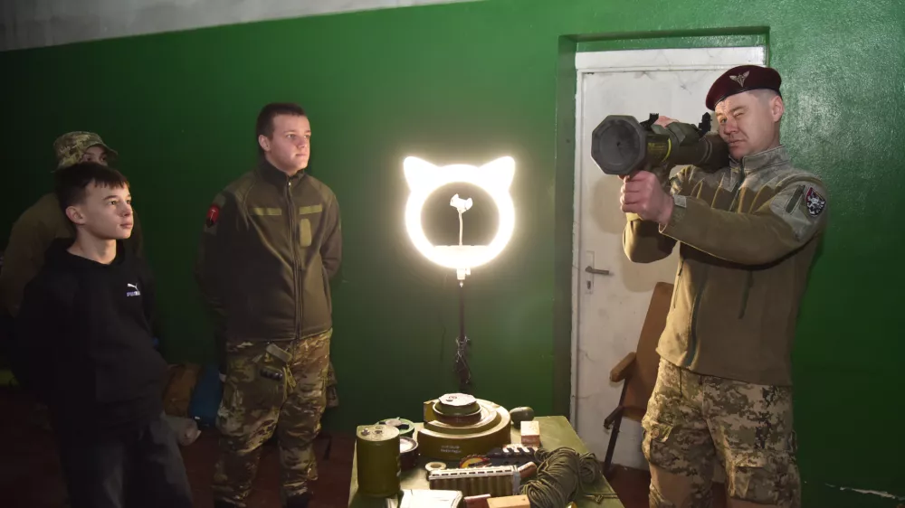 LVIV, UKRAINE - DECEMBER 20: Teenagers attend the 'Galician Lions 2.0' military training from the 80th Galician Brigade in Lviv, Ukraine, December 20, 2025. During the training, the children received training in parachute training, communications, engineering, and drones. Michael Sorrow / AnadoluNo Use USA No use UK No use Canada No use France No use Japan No use Italy No use Australia No use Spain No use Belgium No use Korea No use South Africa No use Hong Kong No use New Zealand No use Turkey