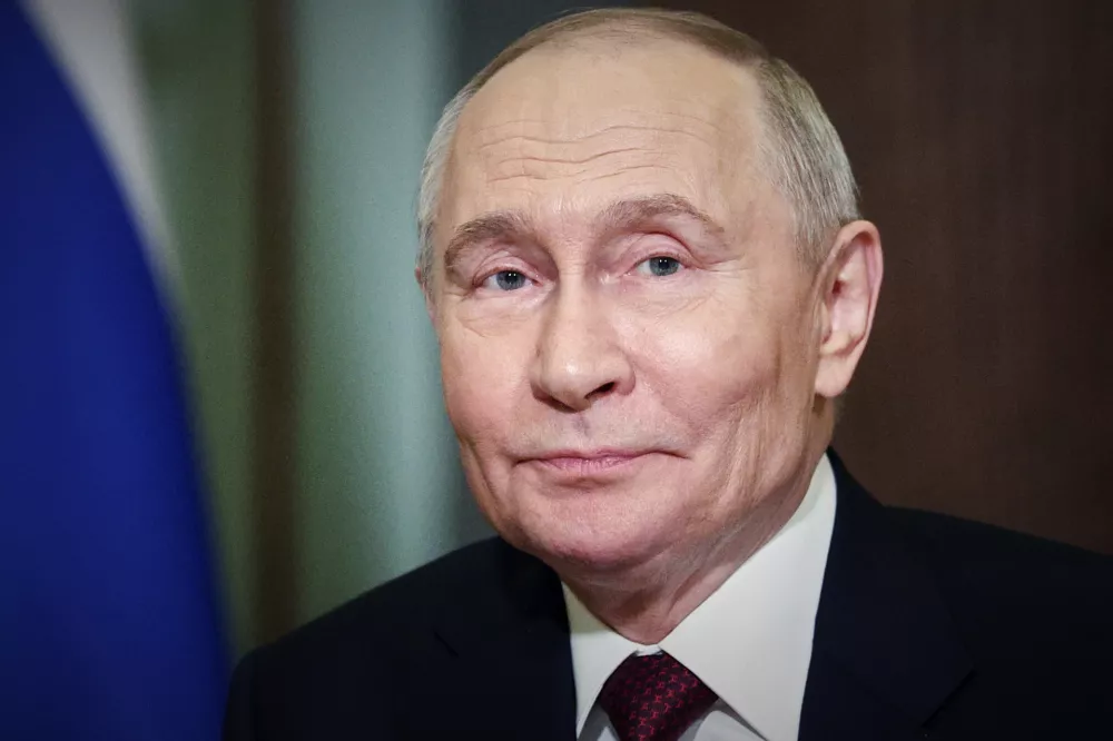 Russian President Vladimir Putin pauses while talking with Armenian Prime Minister Nikol Pashinyan on the sidelines of a summit of the Commonwealth of Independent States (CIS), a grouping of former Soviet nations at the State Hermitage Museum in St. Petersburg, Russia, Monday, Dec. 22, 2025. (Sergey Bulkin, Sputnik, Kremlin Pool Photo via AP)