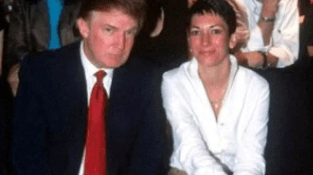 Ghislaine Maxwell and Donald Trump are shown in this image released by the Department of Justice in Washington, D.C., U.S., on December 23, 2025 as part of a new trove of documents from its investigations into the late financier and convicted sex offender Jeffrey Epstein. U.S. Justice Department/Handout via REUTERS  THIS IMAGE HAS BEEN SUPPLIED BY A THIRD PARTY   TPX IMAGES OF THE DAY
