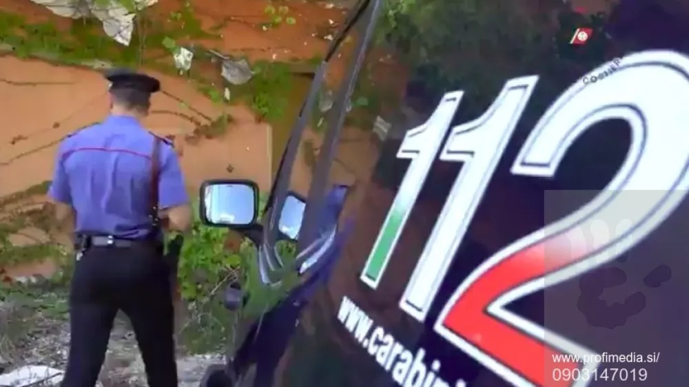 Story from Jam Press (Mafia Village Seized) Pictured: A video grab of the police seizing a mini 'mafia holiday village' that was built illegally, 40 years ago. VIDEO: Cops seize mini 'mafia holiday village' with 43 homes illegally built 40 years agoPolice have seized a mini "mafia holiday village" consisting of 43 homes &ndash; four decades after it sprung up in a prime real estate spot by the sea.Brothers Salvatore, Domenico and Pasquale Belforte from the Belforte Clan began building the holiday village in the 1980s.Pasquale is a construction entrepreneur.The homes started out as small containers in a popular area of dunes and pine forests.Seven of the villas were occupied by close relatives of Salvatore and Domenico, who have been in prison for years.The two brothers were bosses and founders of the clan from Marcisiane in northern Italy.Their holiday village is located in Bagnara di Castel Volturno in the north-west of Naples.It was erected in plain sight, but no one ever reported it.Prosecutors ordered the seizure of the properties, which were illegally constructed on public land, on Wednesday 28 August, according to local media.Every summer, the same families gathered at the site, even after the two bosses were arrested.Pasquale, their sister, Rosa, and about 18 other close relatives were holidaying in the village at the time of the seizure.They were among 65 people identified and evicted by the police and the coastguard.The Belforte Clan is among the oldest and most powerful clans of the notorious Camorra criminal organisation.The clan operates in about 15 towns around and in Marcisiane, as reported by NeedToKnow.Its alleged activities include drug trafficking, extortion, loan sharking and construction.The Camorra from Campania is among Italy's "big three" mafias, along with the 'Ndrangheta from Calabria and Cosa Nostra from Sicily.ENDSEDITOR'S NOTE: Quotations have been translated to English.Video Usa,Fotografija:903147019, Licenca:Rights-managed, Omejitve:, Model izdaje:no