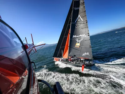 In this photo provided by the Cruising Yacht Club of Australia, Comanche crosses the finish line in Hobart, Australia, Sunday, Dec. 28, 2025, to claim line honors in the Sydney Hobart yacht race. (Kurt Arrigo/CYCA via AP)