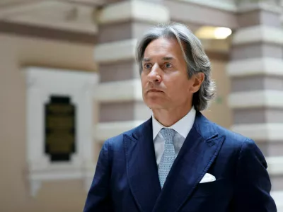 Former Austrian Finance Minister Karl-Heinz Grasser leaves after the announcement of the verdict in his appeal process on the high court in Vienna, Austria, March 25, 2025.REUTERS/Lisa Leutner 