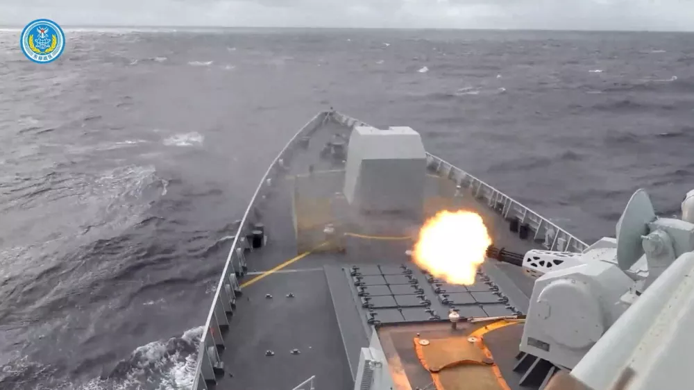 A ship fires a weapon during drills east of Taiwan, in this screenshot from a video released by the Eastern Theatre Command of China's People's Liberation Army (PLA) on December 29, 2025. Eastern Theatre Command/Handout via REUTERS ATTENTION EDITORS - THIS IMAGE WAS PROVIDED BY A THIRD PARTY. MANDATORY CREDIT. NO RESALES. NO ARCHIVES.   TPX IMAGES OF THE DAY