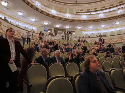 Spectators sit at auditorium of the Mariupol Drama Theatre re-opened its doors for the first time in more than three years, after it was badly damaged during fighting between Russian and Ukrainian forces in Mariupol, Russian-controlled Donetsk region of eastern Ukraine, on Sunday, Dec. 28, 2025. (AP Photo)
