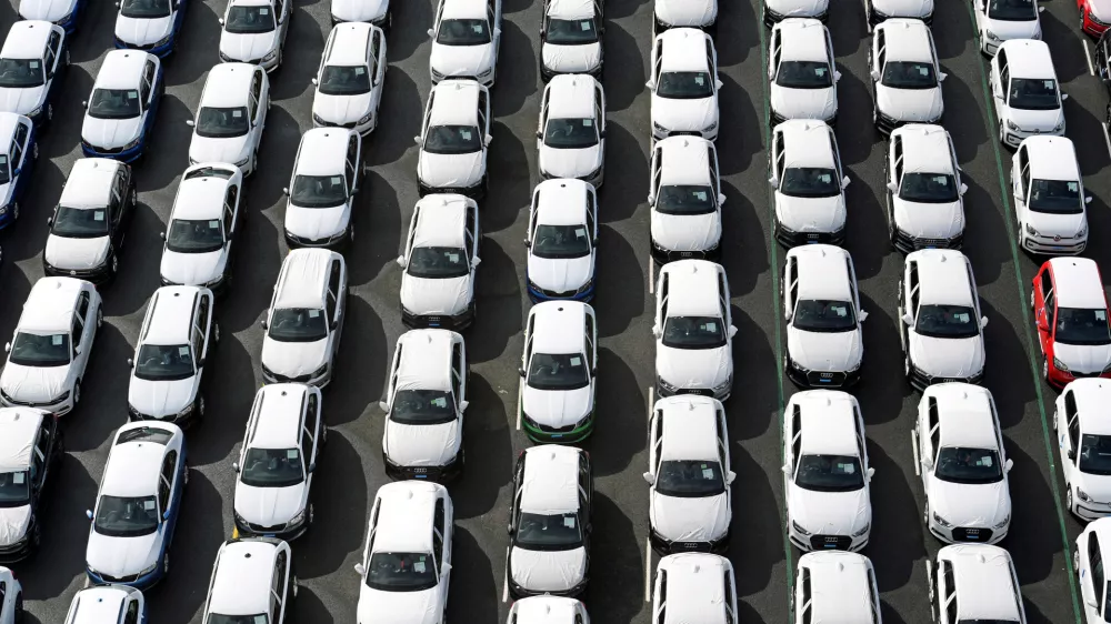 FILE PHOTO: Volkswagen export cars are seen in the port of Emden, beside the VW plant, Germany March 9, 2018. REUTERS/Fabian Bimmer/File Photo