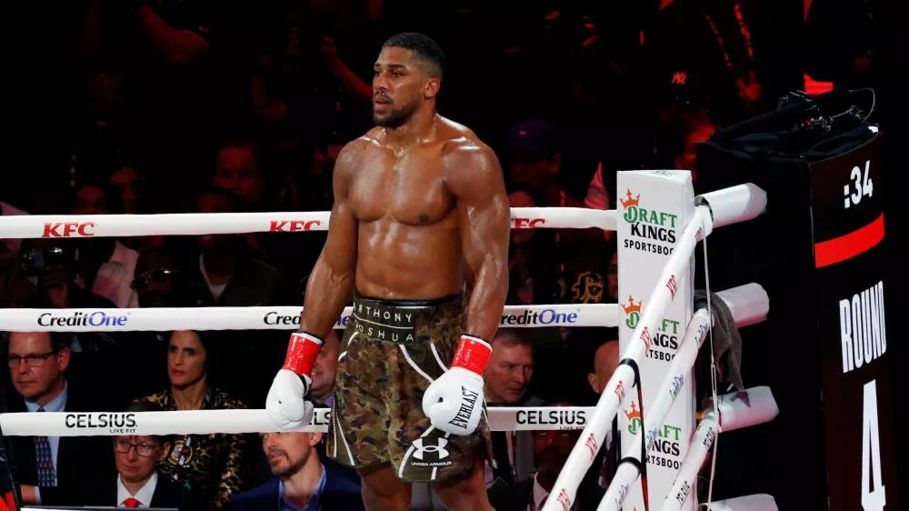 FILE PHOTO: Boxing - Jake Paul v Anthony Joshua - Kaseya Center, Miami, Florida, U.S. - December 19, 2025 Anthony Joshua during his fight against Jake Paul REUTERS/Marco Bello/File Photo