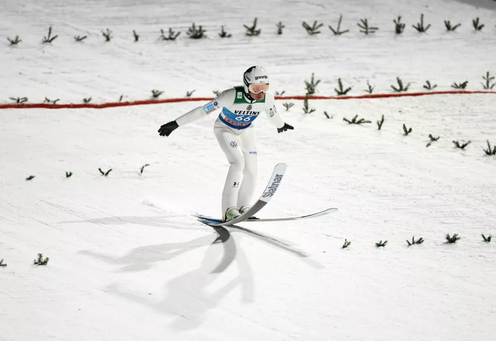 Ski Jumping - Four Hills Tournament - Garmisch-Partenkirchen, Germany - December 31, 2025 Slovenia's Anze Lanisek in action during the men's individual HS142 qualification round REUTERS/Kai Pfaffenbach