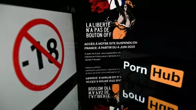 This illustration photo taken on June 4, 2025, in Toulouse, southern France, shows a banned to under 18 symbol, a Pornhub logo, and a display upon connection to the Pronhub pornographic website, with the image of the allegorical figure of Liberty "Marianne" from Eugene Delacroix's 1830 painting "Liberty Leading the People" along with an explanatory text, as the operator blocked the site's access in protest over requirements to check the age of users. French visitors to major adult websites Pornhub, YouPorn and RedTube were met on June 4 with a message denouncing privacy risks from government demands that they verify users' ages. France has this year gradually introduced requirements for all adult websites to have users confirm their age with details like a credit card or ID document, aiming to prevent minors from accessing pornography.,Image: 1007212812, License: Rights-managed, Restrictions:, Model Release: no