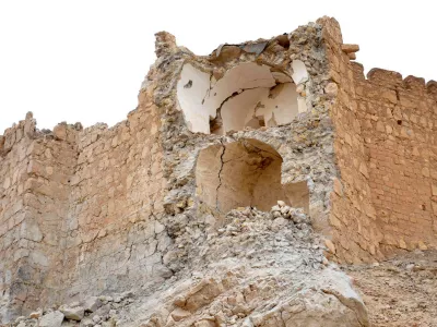 This photo released by the Syrian official news agency SANA, shows damage to the Palmyra citadel following fighting between Government forces and Islamic State group militants in Palmyra, Syria, Sunday, March 27, 2016. Syrian state media and an opposition monitoring group say government forces backed by Russian airstrikes have driven Islamic State fighters from the historic central town of Palmyra, held by the extremists since May. (SANA via AP)