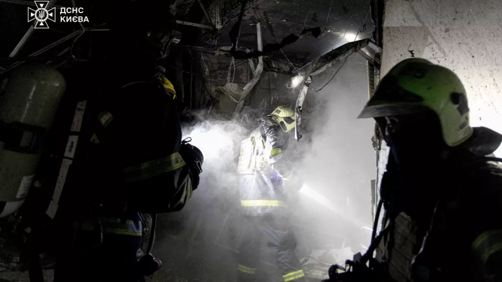 Firefighters work at the site of a private hospital damaged during Russian drone and missile strikes, amid Russia's attack on Ukraine, in Kyiv, Ukraine January 5, 2026. Press service of the State Emergency Service of Ukraine in Kyiv/Handout via REUTERS ATTENTION EDITORS - THIS IMAGE HAS BEEN SUPPLIED BY A THIRD PARTY. DO NOT OBSCURE LOGO.