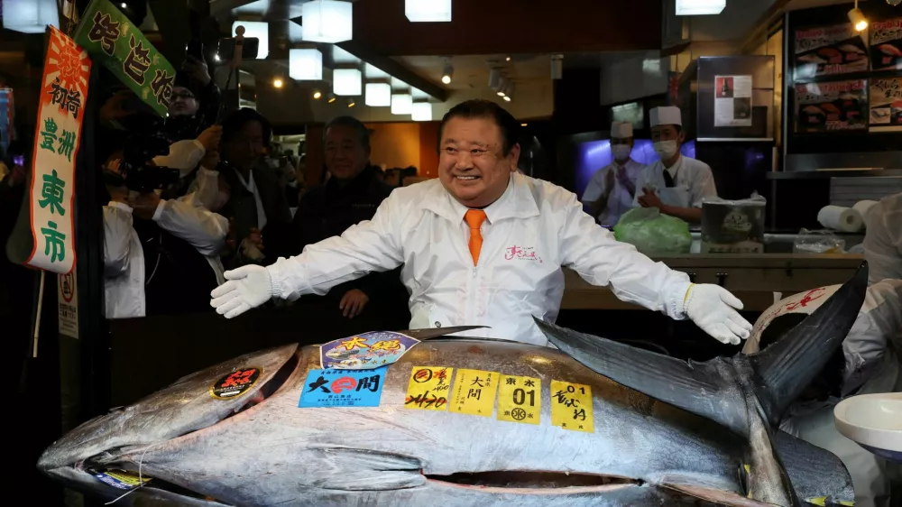 Kiyomura Co.'s President Kiyoshi Kimura, who runs a chain of sushi restaurants Sushi Zanmai, poses with a 243-kilogram bluefin tuna auctioned for a record 510 million yen ($3.24 million) at the first auction of 2026 at Tokyo's Toyosu fish market, at his sushi restaurant in Tokyo, Japan, January 5, 2026. REUTERS/Kim Kyung-Hoon   TPX IMAGES OF THE DAY