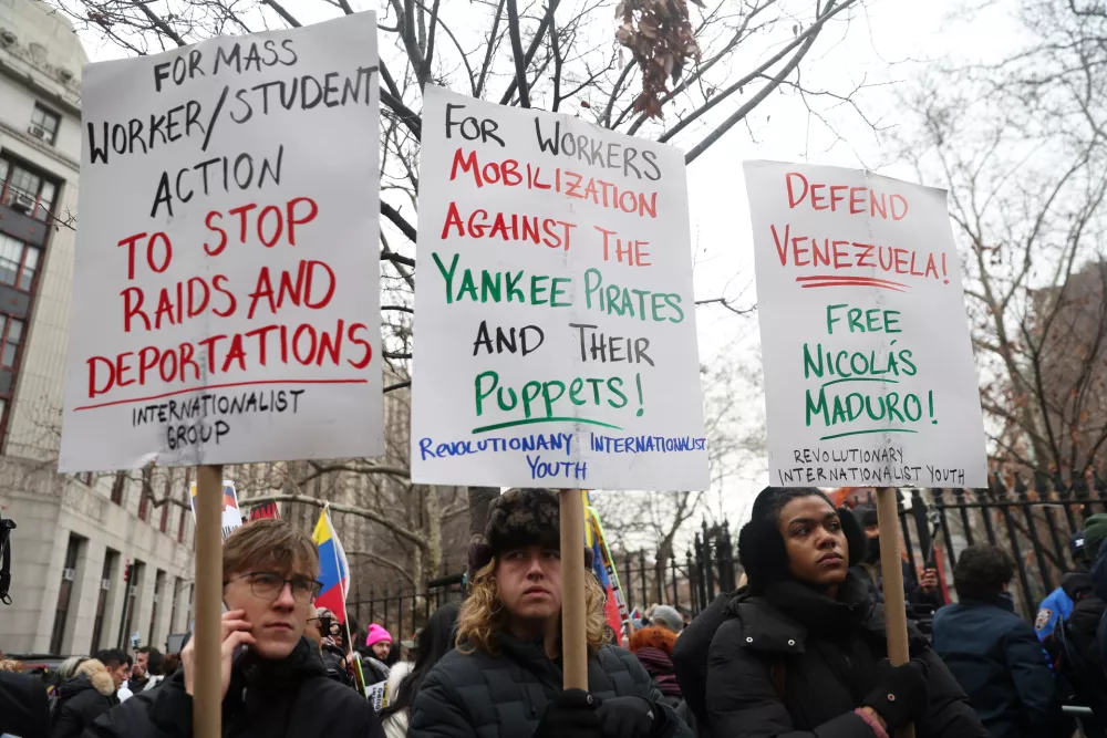 People protest outside Manhattan Federal Court before the arraignment of Venezuelan President Nicolas Maduro, Monday, Jan. 5, 2026, in New York. (AP Photo/Heather Khalifa)