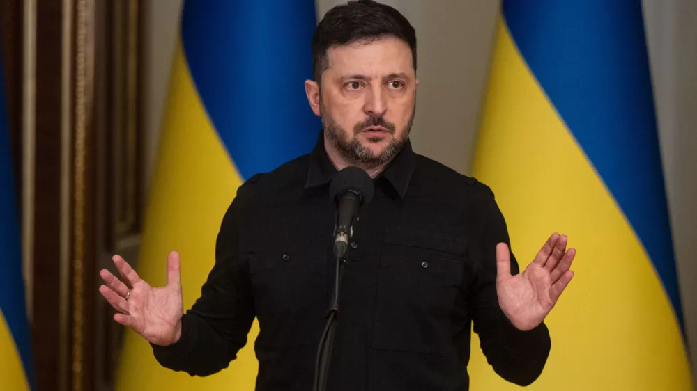 Ukraine's President Volodymyr Zelenskyy speaks during a briefing in Kyiv, Ukraine, Saturday, Jan. 3, 2026. (AP Photo/Danylo Antoniuk)