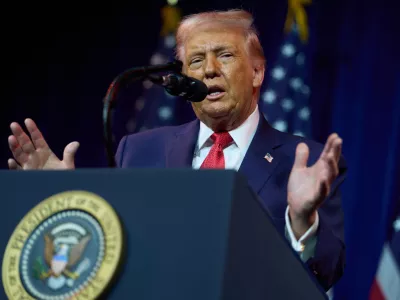 President Donald Trump speaks to House Republican lawmakers during their annual policy retreat, Tuesday, Jan. 6, 2026, in Washington. (AP Photo/Evan Vucci)