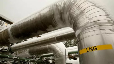 FILE PHOTO: Snow-covered transfer lines are seen at the Dominion Cove Point Liquefied Natural Gas (LNG) terminal in Lusby, Maryland March 18, 2014. REUTERS/Gary Cameron//File Photo