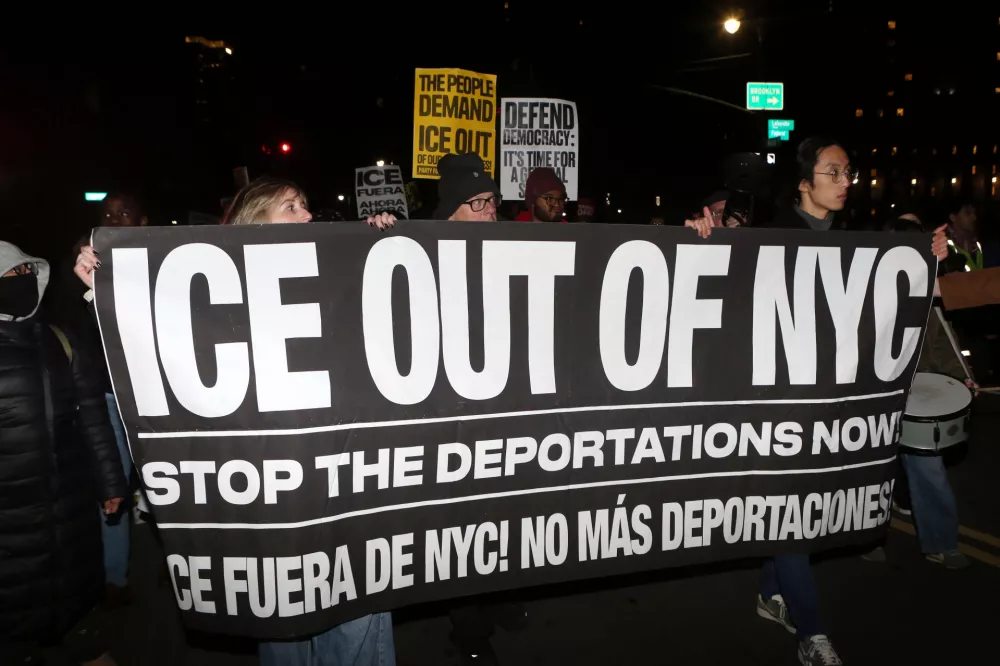 07 January 2026, US, New York City: New Yorkers protest after Minneapolis woman Renee Good was shot and killed by an ICE officer. The New York Immigration Coalition (NYIC) held a protest in Foley Square. Photo: Krista Kennell/ZUMA Press Wire/dpa