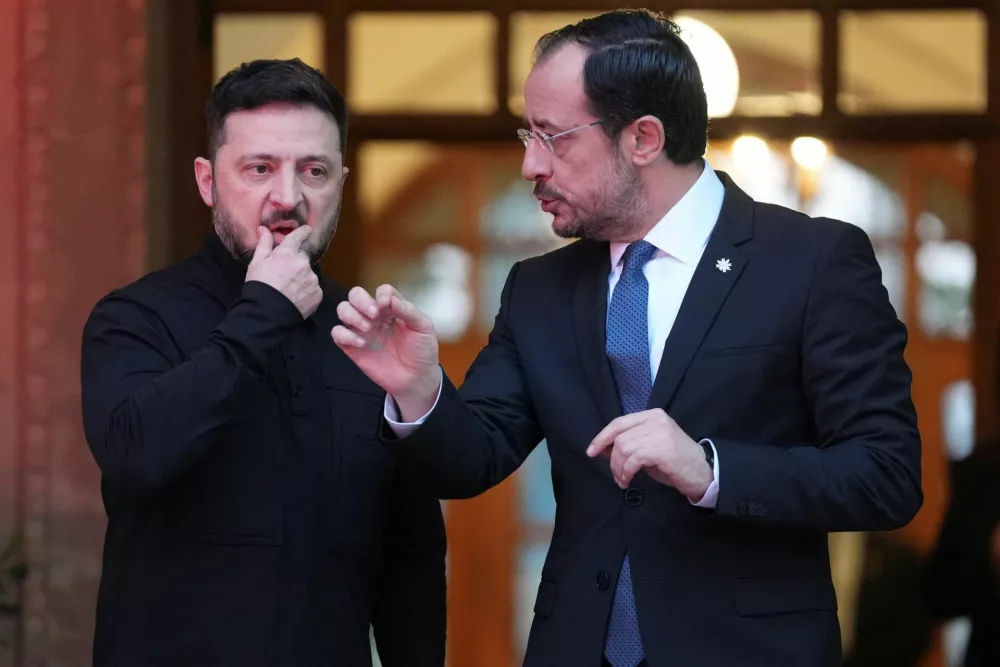 Ukraine's President Volodymyr Zelenskyy listens as Cyprus' President Nikos Christodoulides speaks while leaving after a meeting at the presidential palace in Nicosia, Cyprus, January 7, 2026. Petros Karadjias/Pool via REUTERS