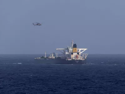 A U.S. military helicopter flies over the Panama-flagged Centuries, which was intercepted by the U.S. Coast Guard, days after U.S. President Donald Trump announced a "blockade" of all sanctioned oil tankers entering and leaving Venezuela, east of Barbados in the Caribbean Sea December 20, 2025. DHS/Handout via REUTERS  THIS IMAGE HAS BEEN SUPPLIED BY A THIRD PARTY