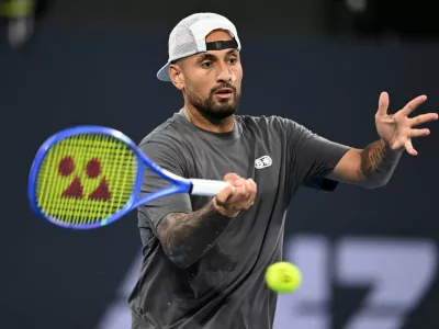 FILE PHOTO: Tennis - Brisbane International Tennis Tournament - Queensland Tennis Centre, Brisbane, Australia - January 4, 2026 Australia's Nick Kyrgios in action during his men's doubles round of 32 match with Australia's Thanasi Kokkinakis against Australia's Matthew Ebden and Rajeev Ram of the U.S. ZAIN MOHAMMED/AAP Image via REUTERS   ATTENTION EDITORS - THIS IMAGE WAS PROVIDED BY A THIRD PARTY. NO RESALES. NO ARCHIVES. AUSTRALIA OUT. NEW ZEALAND OUT/File Photo