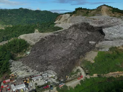 An aerial view of a huge mound of garbage that collapsed at a waste segregation facility in Binaliw, Cebu city on Friday, Jan. 9, 2026. (AP Photo/Jacqueline Hernandez)