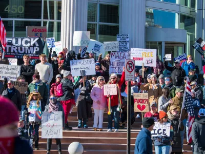 10 January 2026, US, Salt Lake CityProtesters hold signs during the 'ICE Out for Good' protest in Salt Lake City, a demonstration against US Immigration and Customs Enforcement (ICE) and calling for justice for Renee Nicole Good, who was fatally shot by an ICE agent in Minneapolis. PhotoCharles-Mcclintock Wilson/ZUMA Press Wire/dpa