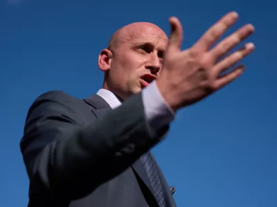 White House deputy chief of staff Stephen Miller speaks with reporters at the White House, Monday, Oct. 6, 2025, in Washington. (AP Photo/Evan Vucci)
