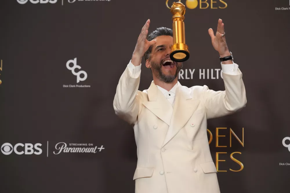 Wagner Moura poses in the press room with the award for best performance by a male actor in a motion picture &ndash; drama for "The Secret Agent" during the 83rd Golden Globes on Sunday, Jan. 11, 2026, at the Beverly Hilton in Beverly Hills, Calif. (AP Photo/Chris Pizzello)