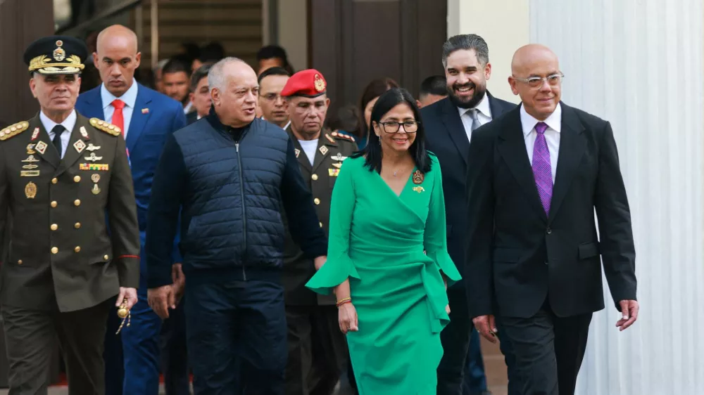 FILE PHOTO: Venezuela's Defence Minister Vladimir Padrino Lopez, Interior Minister Diosdado Cabello, interim President Delcy Rodriguez, Nicolas Maduro Guerra, son of ousted president Nicolas Maduro, and National Assembly President Jorge Rodriguez, walk together at the National Assembly, in Caracas, Venezuela, January 5, 2026. Marcelo Garcia/Miraflores Palace/Handout via REUTERS ATTENTION EDITORS - THIS IMAGE HAS BEEN SUPPLIED BY A THIRD PARTY/File Photo